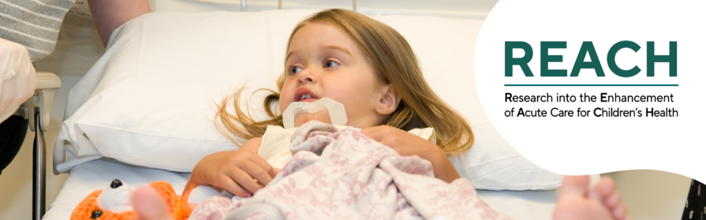Child on hospital bed with an orange plushie on her side.