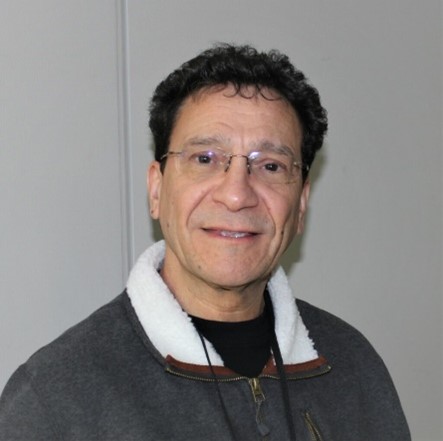 headshot of dr. aziz mhanni